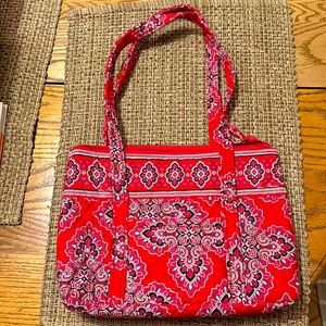 Gently used Vera Bradley red handbag.